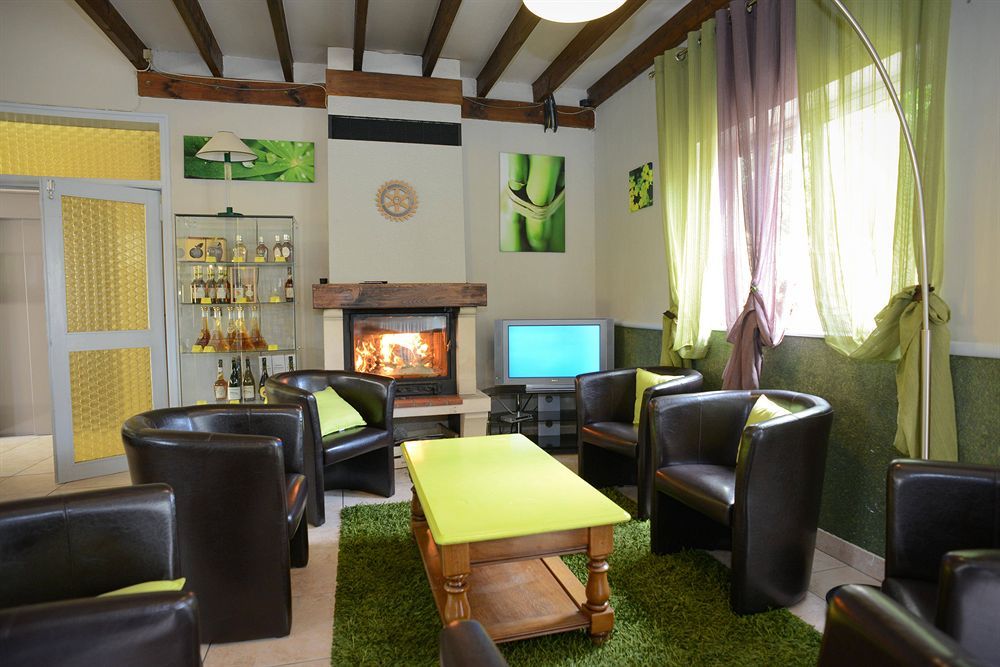 Brit Hotel Le Cygne Сент-Илер-дю-Аркуэ Экстерьер фото
